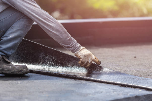 Professional Basement Waterproofing technician working in Scottsville, KY